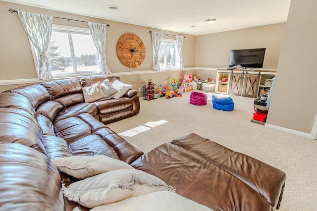 living room featuring visible vents, baseboards, and carpet flooring