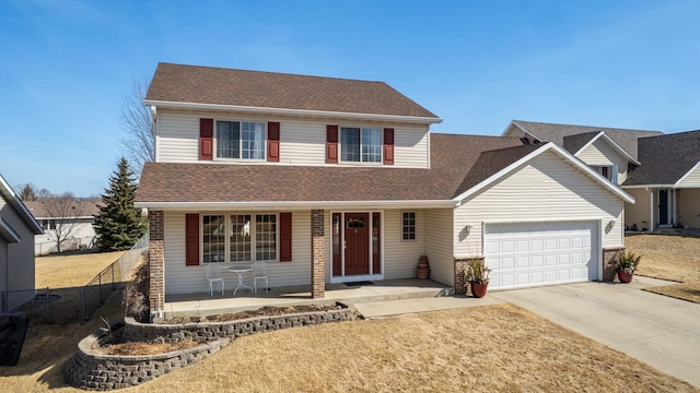 traditional-style home with driveway, fence, roof with shingles, covered porch, and brick siding