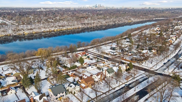 birds eye view of property featuring a residential view and a water view