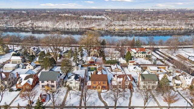 birds eye view of property featuring a residential view and a water view