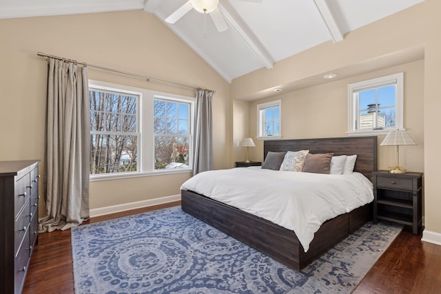 bedroom featuring vaulted ceiling with beams, a ceiling fan, baseboards, and dark wood-style flooring