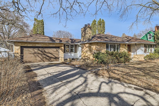 single story home featuring a chimney, stone siding, concrete driveway, and a garage