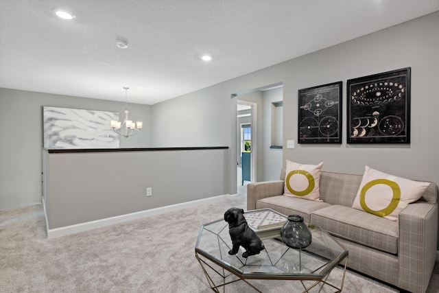 living room featuring recessed lighting, baseboards, carpet floors, and a chandelier