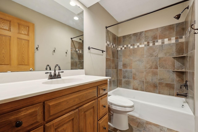 full bath with vanity, toilet, and  shower combination