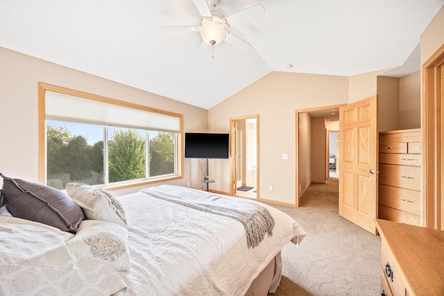 bedroom featuring ceiling fan, lofted ceiling, baseboards, and light carpet