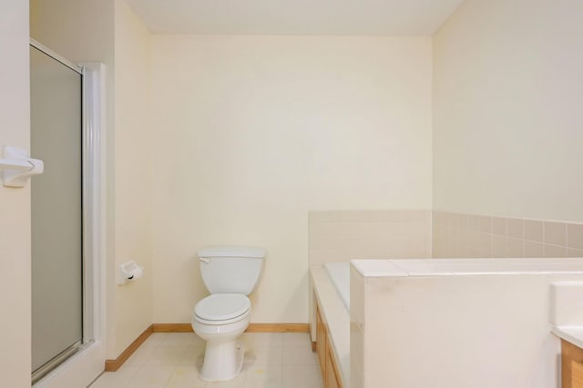 full bathroom featuring tile patterned flooring, a shower stall, toilet, and baseboards