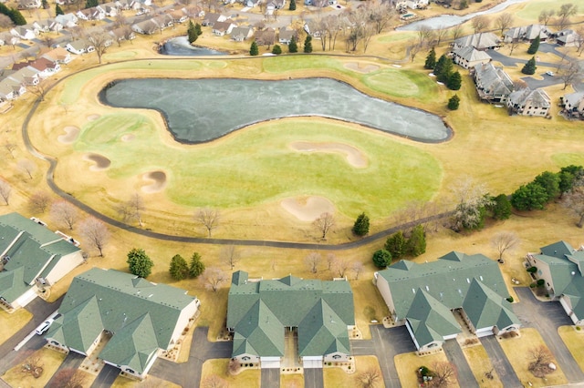 birds eye view of property with a residential view and view of golf course