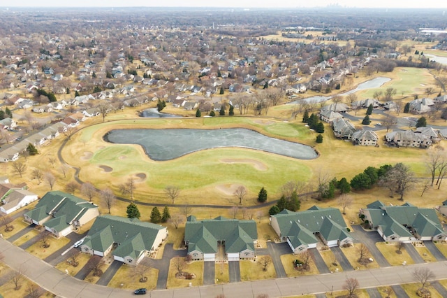 birds eye view of property featuring view of golf course and a residential view