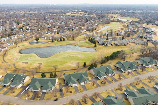 drone / aerial view with a residential view and golf course view