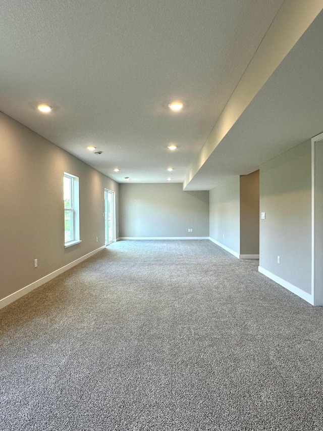 7856 Martin Ave NE, Otsego, MN 55330 - carpeted spare room featuring baseboards, recessed lighting, and a textured ceiling