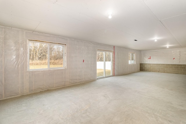 spare room with concrete floors