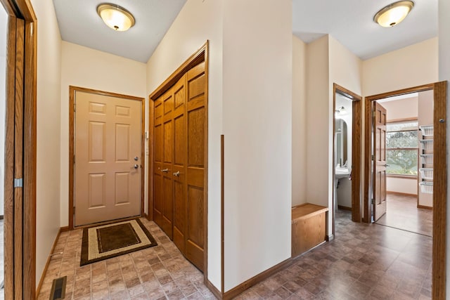 interior space with visible vents and baseboards