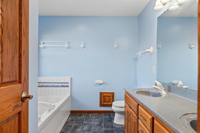 bathroom with toilet, a garden tub, double vanity, tile patterned floors, and a sink