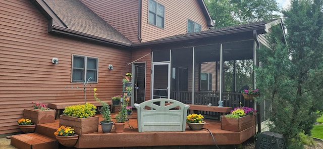 deck featuring a sunroom