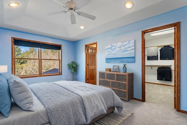 3135 Sherburn Pl SW, Rochester, MN 55902 - carpeted bedroom with a spacious closet, a raised ceiling, baseboards, a closet, and recessed lighting