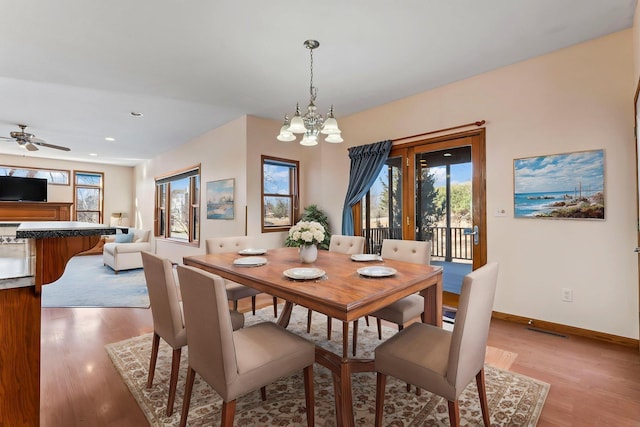 3135 Sherburn Pl SW, Rochester, MN 55902 - dining space featuring plenty of natural light, a chandelier, light wood-type flooring, and recessed lighting