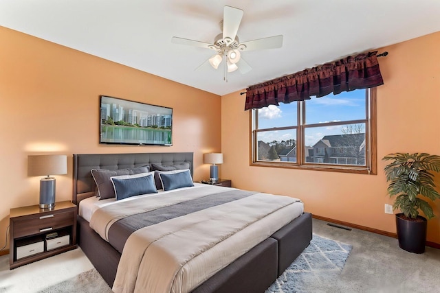 3135 Sherburn Pl SW, Rochester, MN 55902 - bedroom featuring carpet floors, baseboards, and ceiling fan