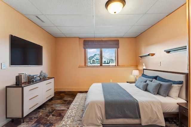 3135 Sherburn Pl SW, Rochester, MN 55902 - bedroom with a paneled ceiling, dark stone finish flooring, and baseboards