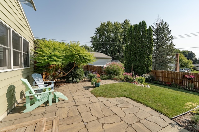 view of patio featuring fence