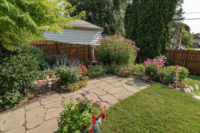 view of yard with a patio area and fence