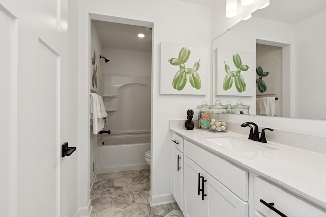 full bath featuring baseboards, toilet, bathing tub / shower combination, marble finish floor, and vanity