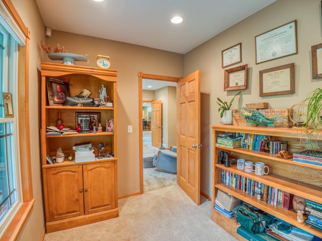 interior space featuring recessed lighting, baseboards, and carpet floors