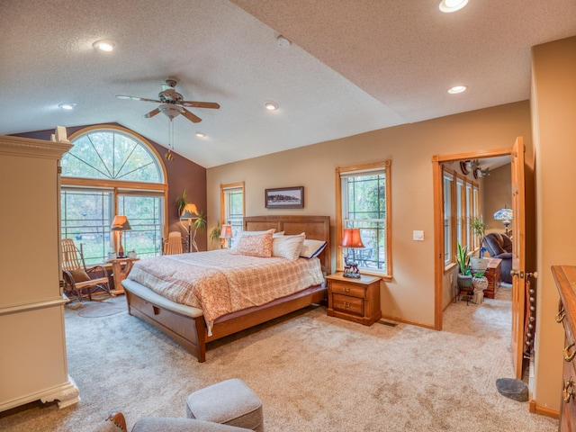 carpeted bedroom featuring lofted ceiling, recessed lighting, baseboards, and a textured ceiling