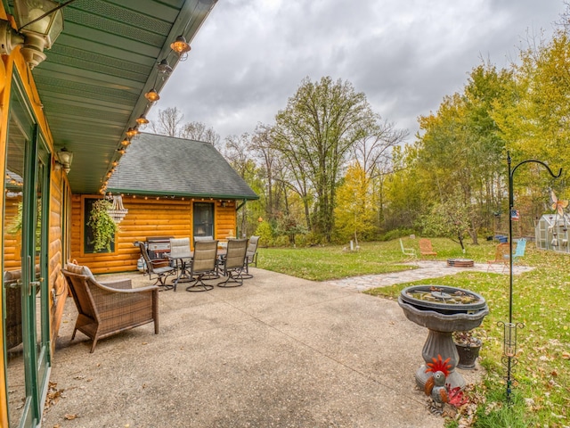 view of patio featuring outdoor dining space