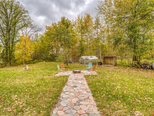 view of yard with an exterior structure and an outdoor structure