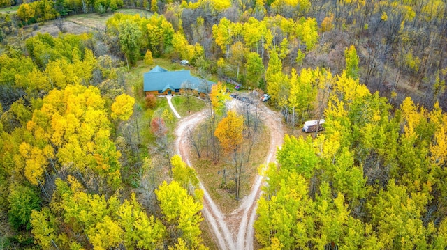 bird's eye view featuring a forest view