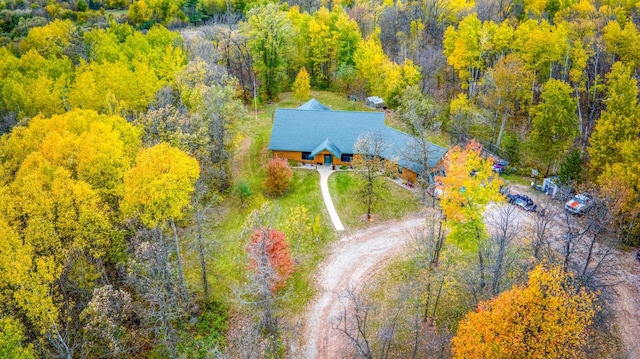 drone / aerial view with a view of trees