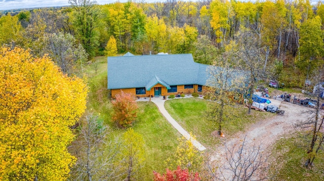 aerial view with a wooded view