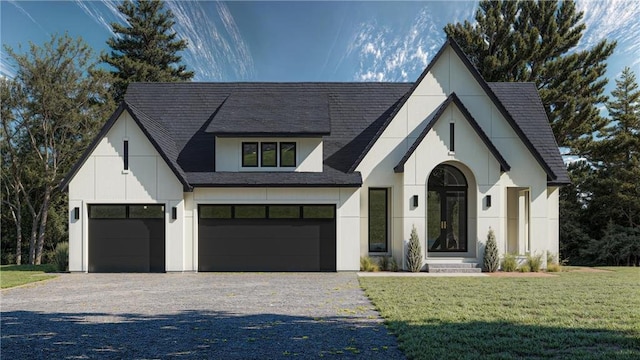 view of front of home with gravel driveway, a front lawn, a garage, and roof with shingles