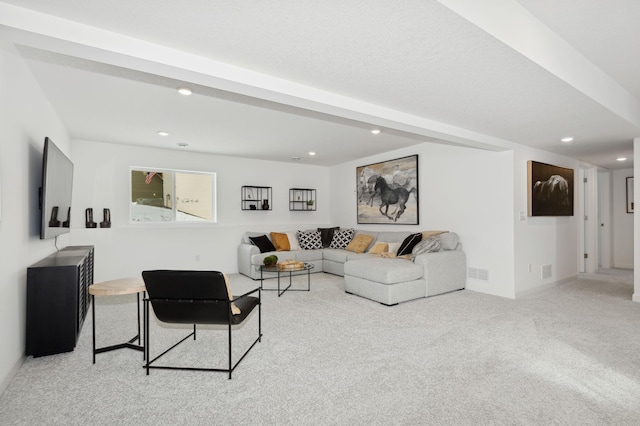 carpeted living room featuring recessed lighting and visible vents