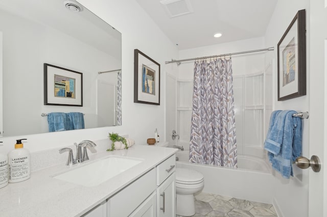 full bathroom featuring visible vents, vanity, toilet, and shower / tub combo with curtain