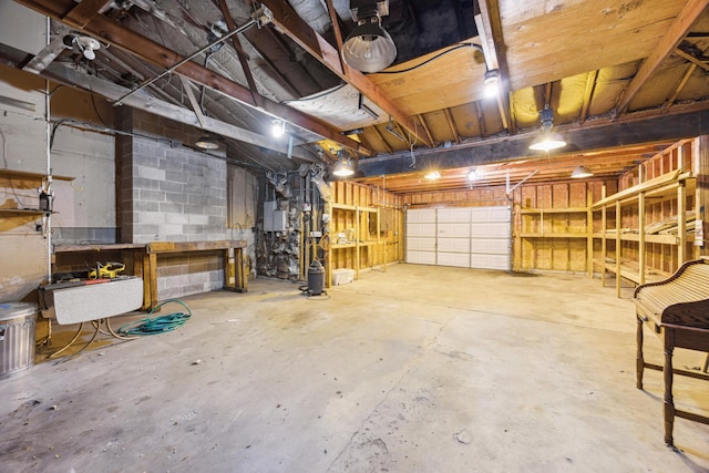 garage with concrete block wall