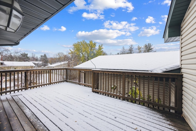 view of snow covered deck