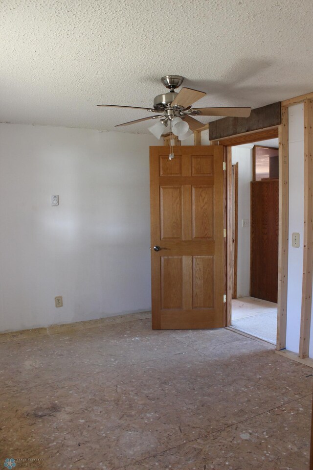 203 4th St, Argusville, ND 58005 - empty room with a textured ceiling and ceiling fan