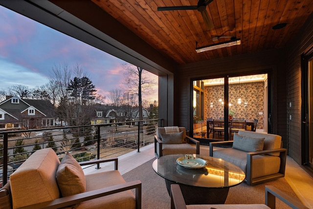 sunroom featuring a residential view