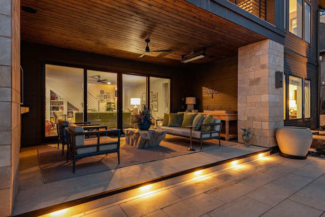 view of patio featuring an outdoor hangout area and a ceiling fan