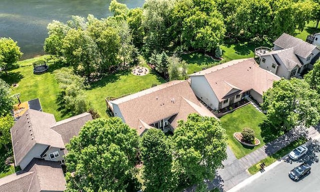 birds eye view of property with a residential view and a water view