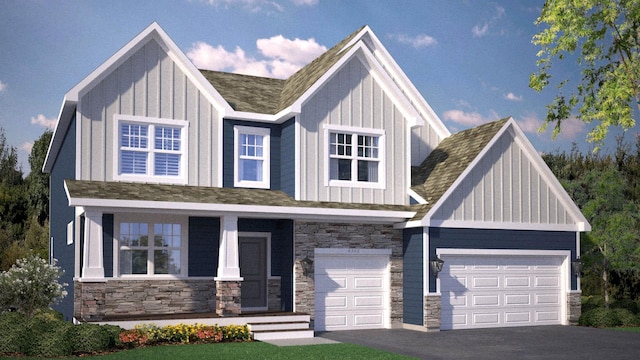 craftsman house with stone siding, board and batten siding, an attached garage, and driveway