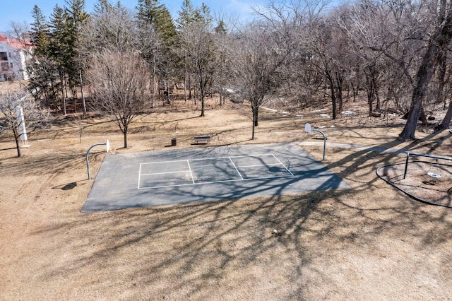 view of yard with community basketball court