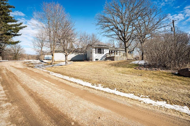 view of front of property featuring driveway and a garage