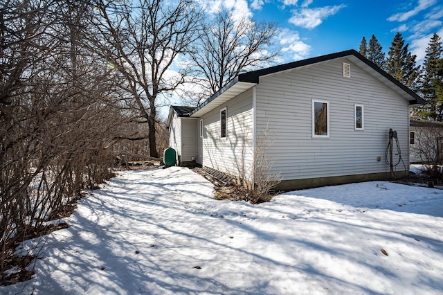 view of snow covered property