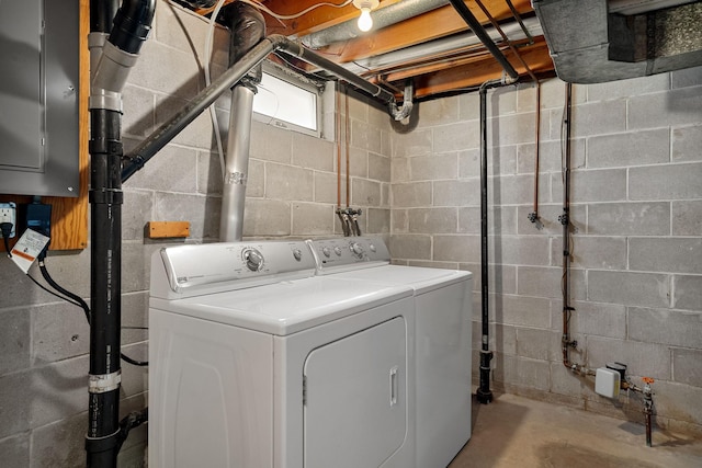 clothes washing area with washer and dryer and laundry area