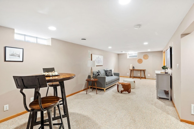 living area featuring visible vents, recessed lighting, baseboards, and carpet floors