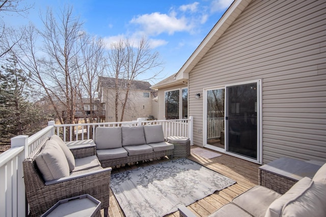 wooden terrace with outdoor lounge area