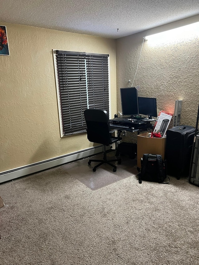 office space with a textured ceiling and a textured wall