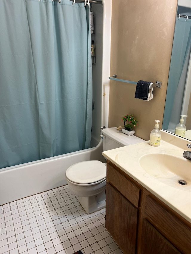 bathroom featuring tile patterned flooring, toilet, vanity, and shower / bathtub combination with curtain